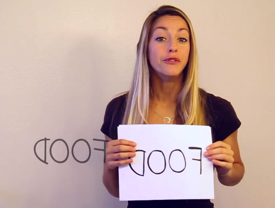 Why do mirrors flip horizontally ?