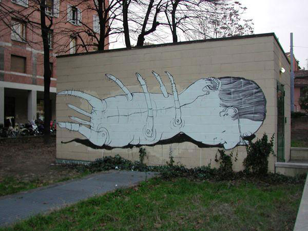 blu-lartiste-urbain-qui-metamorphose-les-facades-dimmeubles-avec-ses-peintures-engagees106