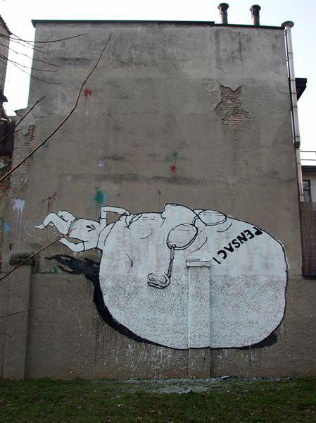 blu-lartiste-urbain-qui-metamorphose-les-facades-dimmeubles-avec-ses-peintures-engagees107