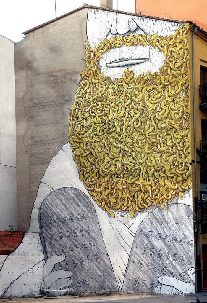 blu-lartiste-urbain-qui-metamorphose-les-facades-dimmeubles-avec-ses-peintures-engagees11