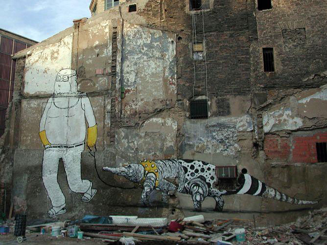 blu-lartiste-urbain-qui-metamorphose-les-facades-dimmeubles-avec-ses-peintures-engagees111