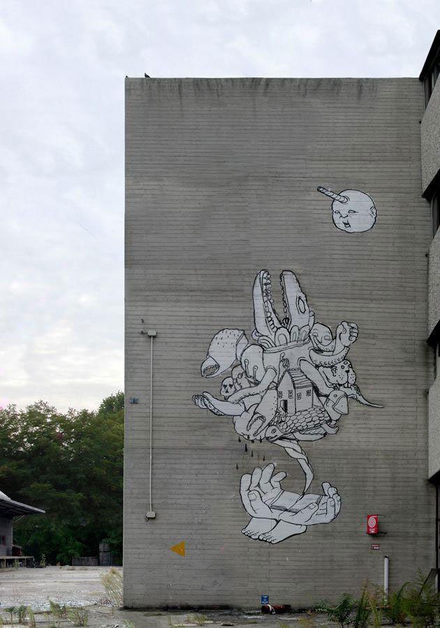 blu-lartiste-urbain-qui-metamorphose-les-facades-dimmeubles-avec-ses-peintures-engagees115