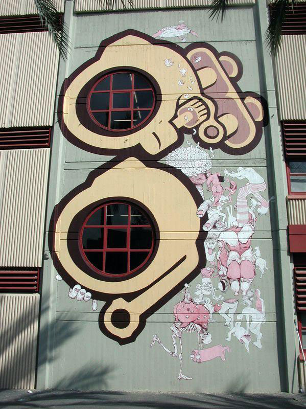 blu-lartiste-urbain-qui-metamorphose-les-facades-dimmeubles-avec-ses-peintures-engagees14