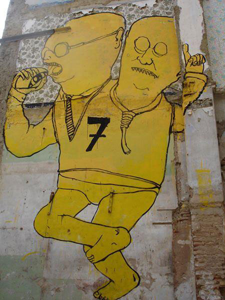 blu-lartiste-urbain-qui-metamorphose-les-facades-dimmeubles-avec-ses-peintures-engagees19