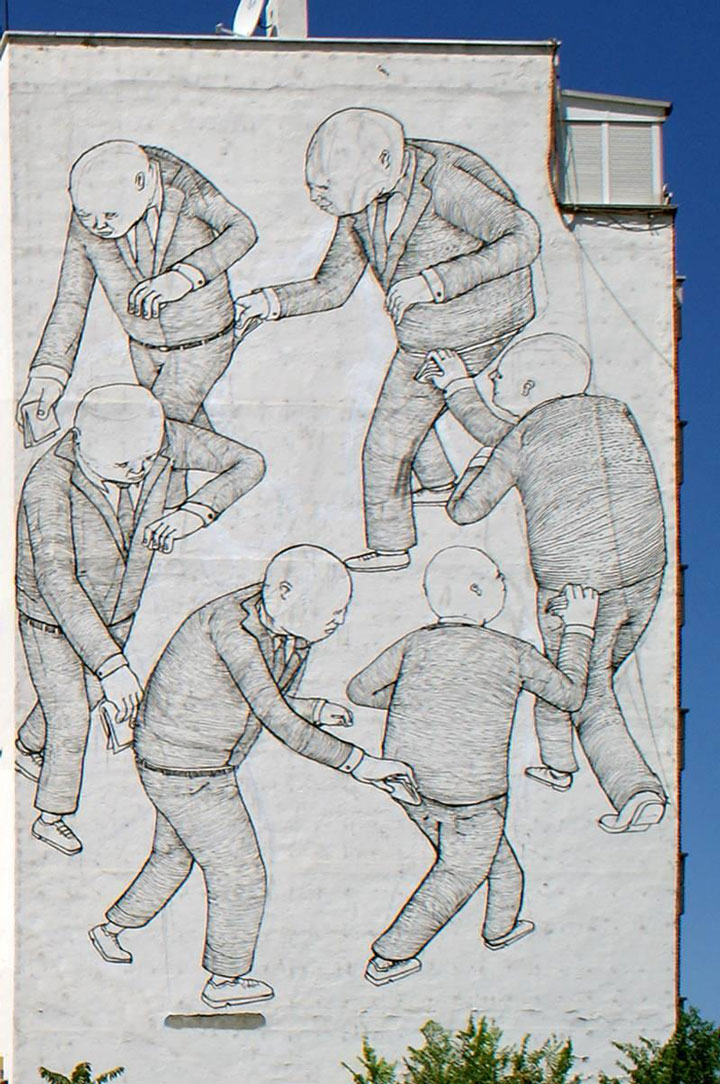blu-lartiste-urbain-qui-metamorphose-les-facades-dimmeubles-avec-ses-peintures-engagees23
