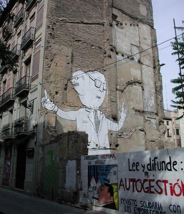 blu-lartiste-urbain-qui-metamorphose-les-facades-dimmeubles-avec-ses-peintures-engagees33
