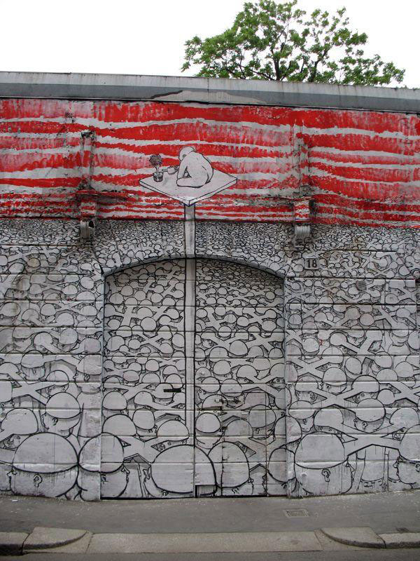 blu-lartiste-urbain-qui-metamorphose-les-facades-dimmeubles-avec-ses-peintures-engagees37