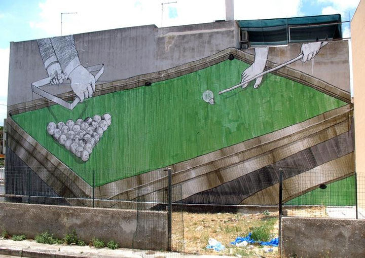 blu-lartiste-urbain-qui-metamorphose-les-facades-dimmeubles-avec-ses-peintures-engagees6