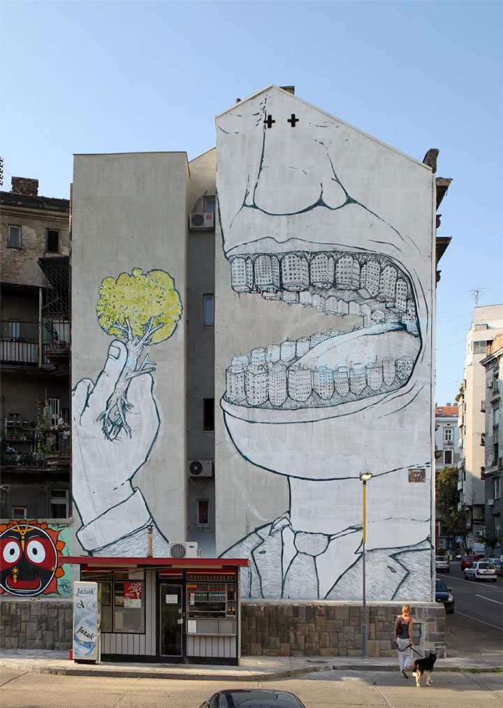 blu-lartiste-urbain-qui-metamorphose-les-facades-dimmeubles-avec-ses-peintures-engagees61