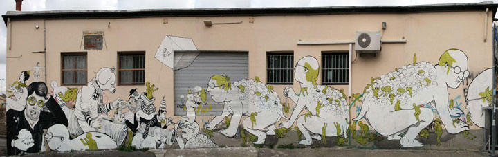 blu-lartiste-urbain-qui-metamorphose-les-facades-dimmeubles-avec-ses-peintures-engagees7