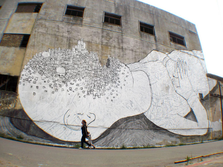 blu-lartiste-urbain-qui-metamorphose-les-facades-dimmeubles-avec-ses-peintures-engagees81