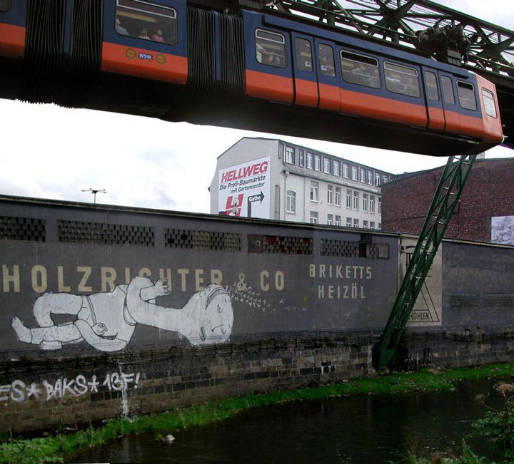blu-lartiste-urbain-qui-metamorphose-les-facades-dimmeubles-avec-ses-peintures-engagees93
