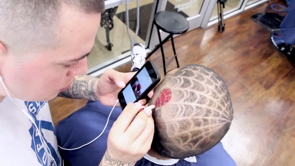 rob-spider-man-coiffeur